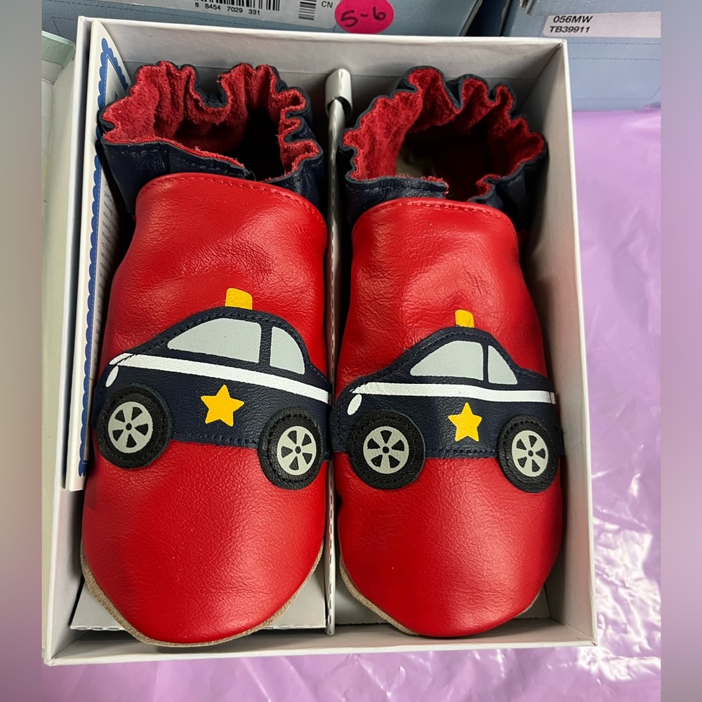 New Robeez soft sole
Police car red/navy